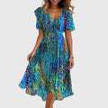Breezy midi dress with a wrap-effect V-neckline, cinched waist and flutter sleeves.