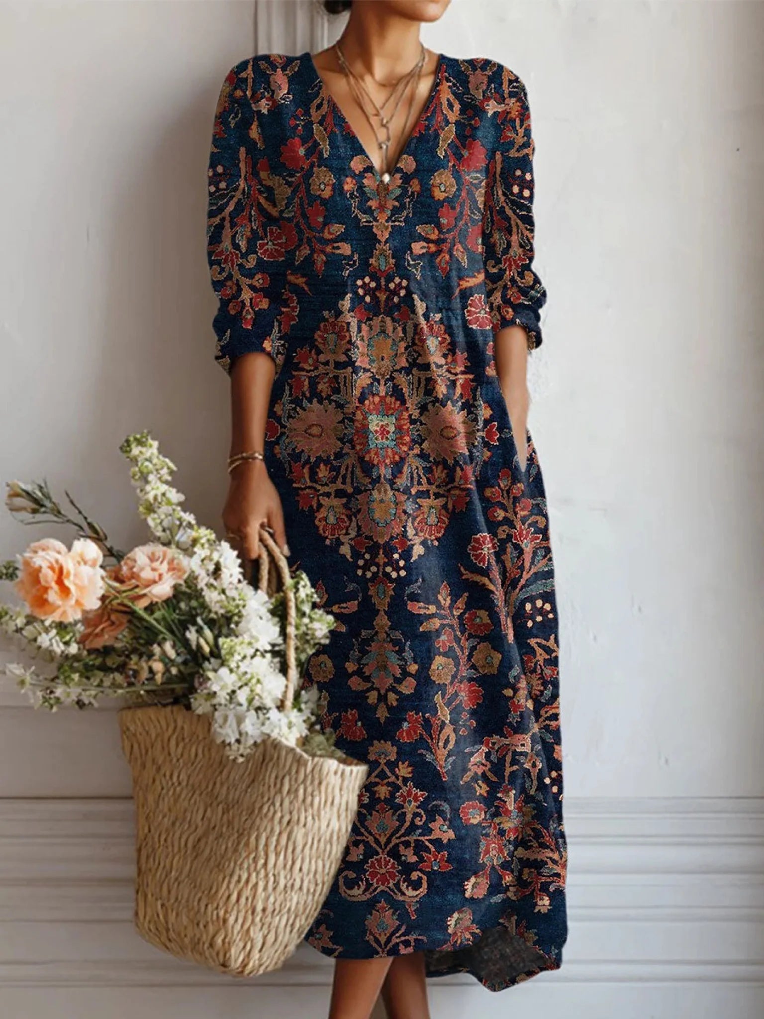 Everyday dress with a smooth, flowing drape, long sleeves and a polished neckline.