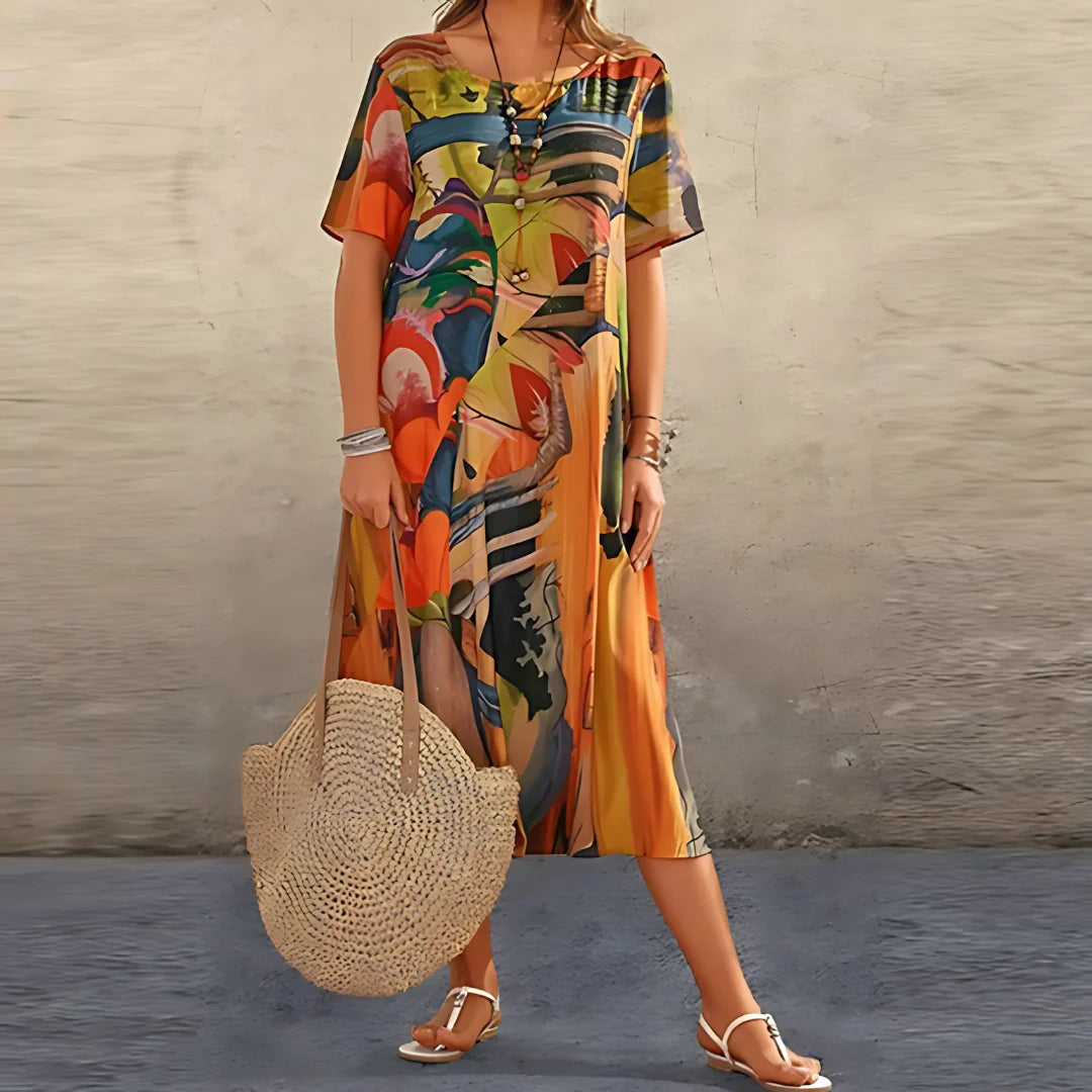 Floral-print dress with a soft, flowing silhouette and airy drape.