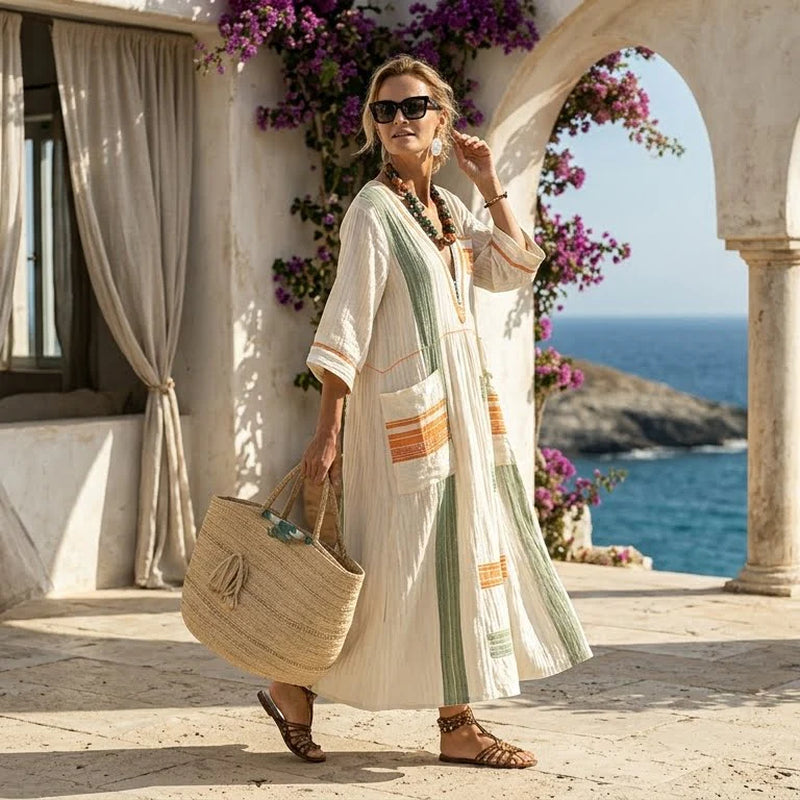 Easy summer dress with practical side pockets and a slight stretch.