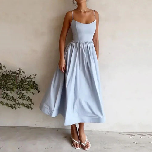 Graceful midi dress with fine straps and a light, easy drape.