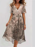 Relaxed summer dress with a light, feminine drape.