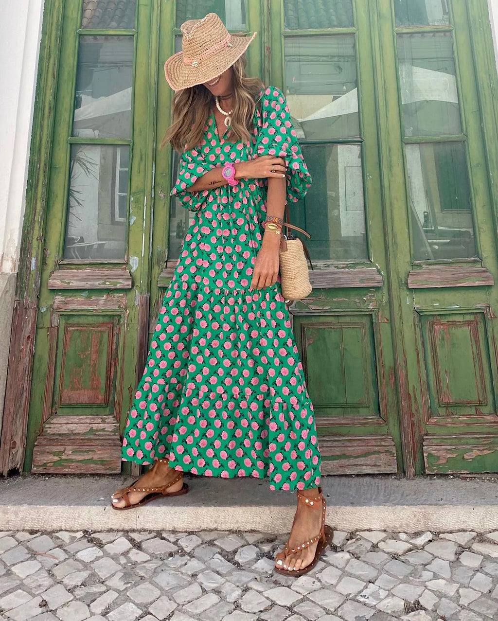 Lightweight floral-print summer dress with an airy, relaxed drape.
