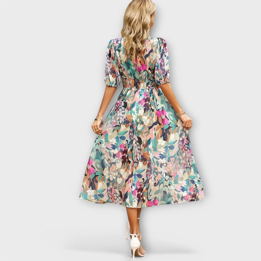 Softly tailored midi dress with a flattering, feminine cut.