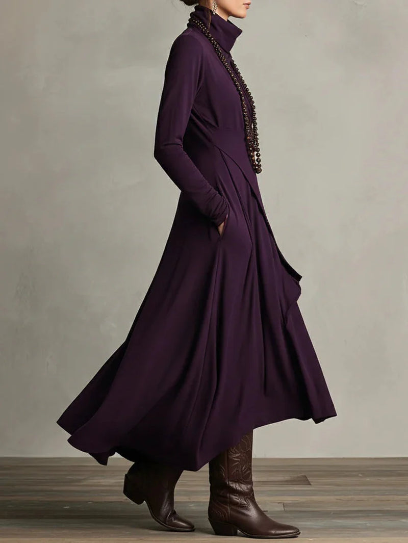 Refined boho maxi dress with a soft V-neck, long sleeves and fluid full-length line.