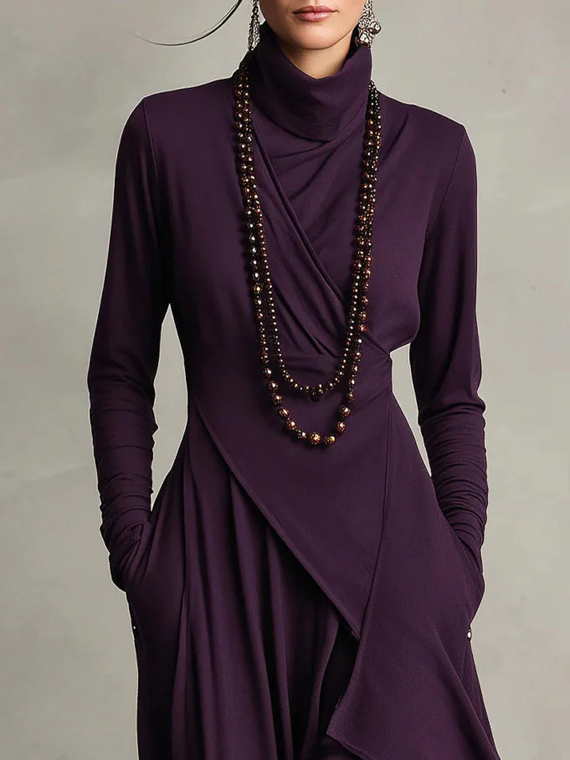 Refined boho maxi dress with a soft V-neck, long sleeves and fluid full-length line.