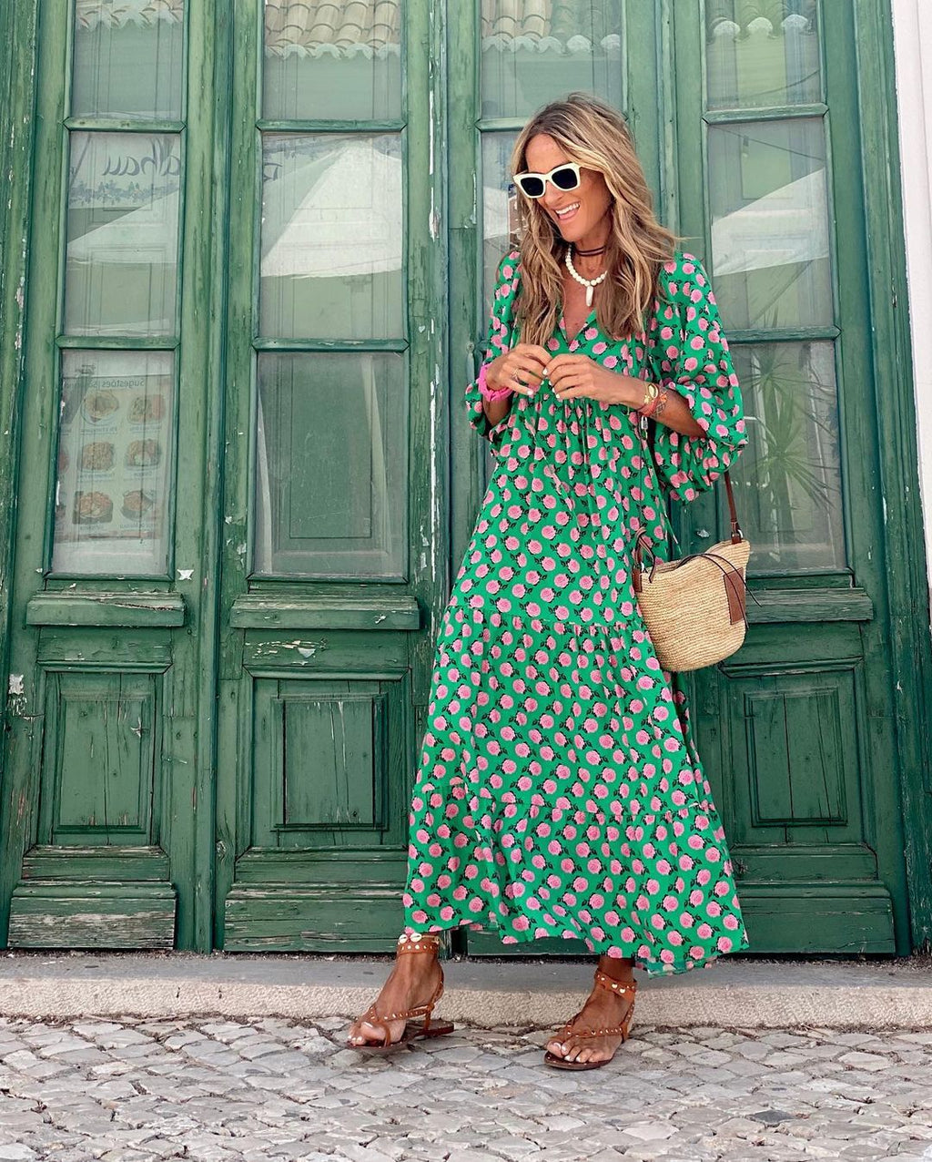 Lightweight floral-print summer dress with an airy, relaxed drape.