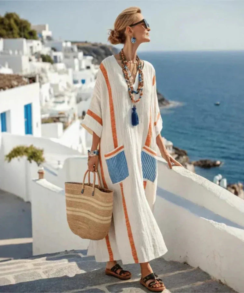 Soft woven-blend summer maxi dress with a relaxed, flowing line.