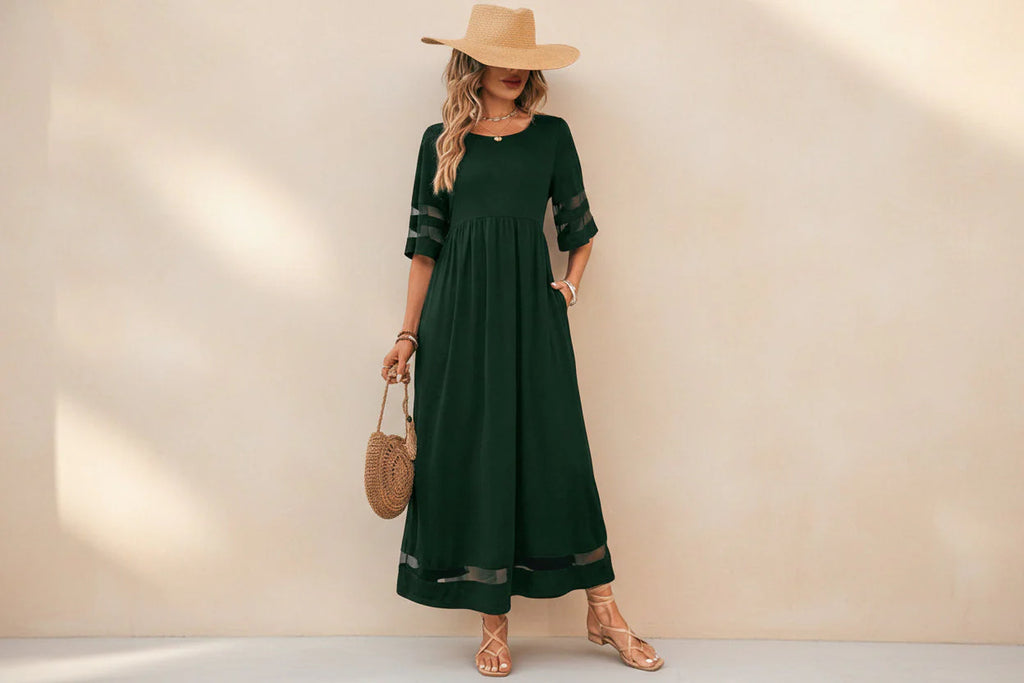 Elegant, easy-to-wear dress with a gently draped line.