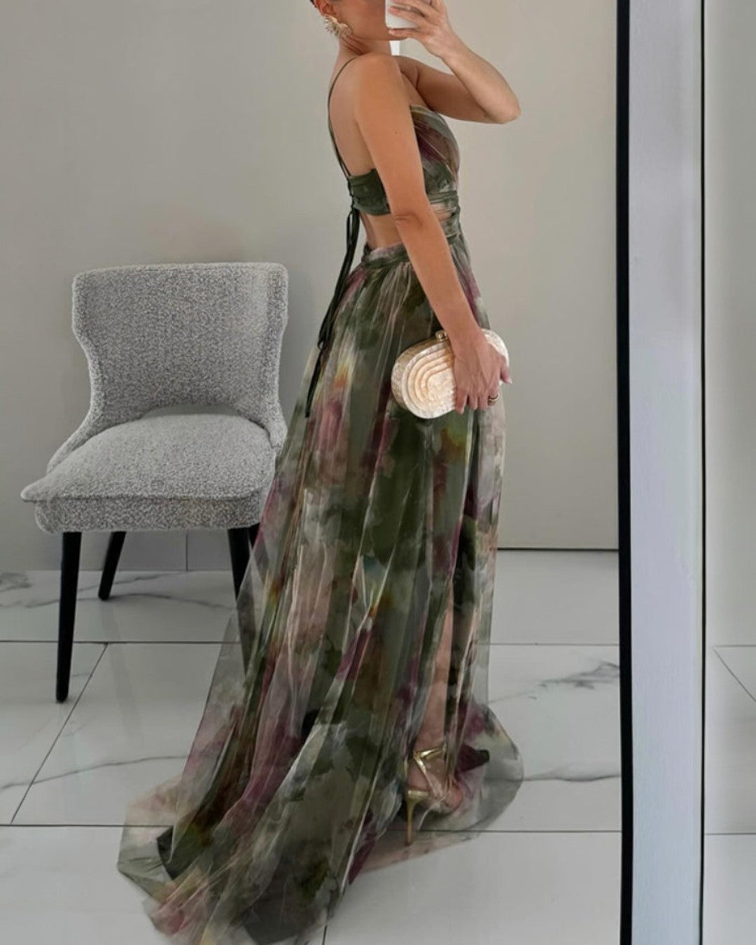 Fluid, romantic dress in a semi-sheer, lightweight construction.