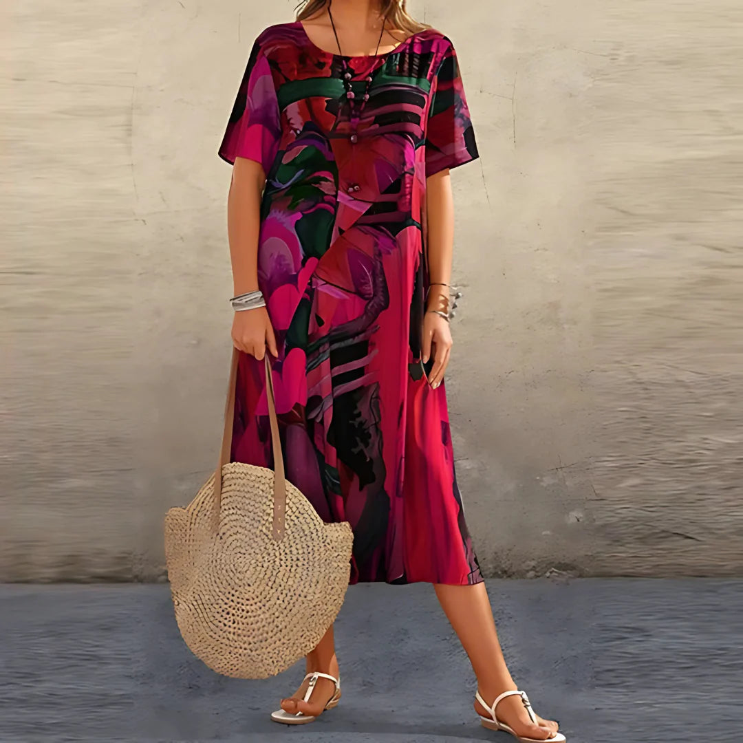 Floral-print dress with a soft, flowing silhouette and airy drape.