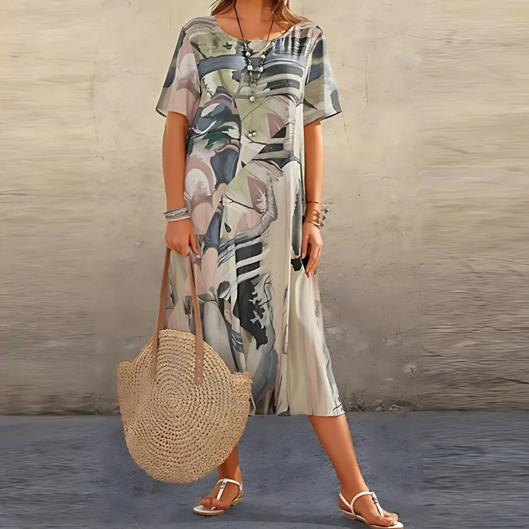 Floral-print dress with a soft, flowing silhouette and airy drape.