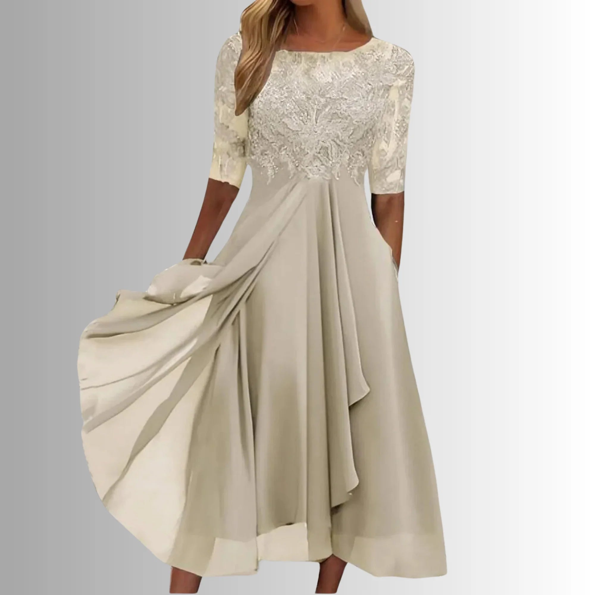 Occasion dress with a delicate lace bodice and a layered, feather-light skirt.