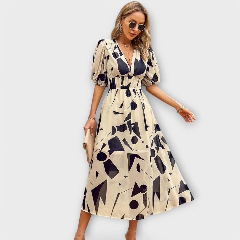 Softly tailored midi dress with a flattering, feminine cut.