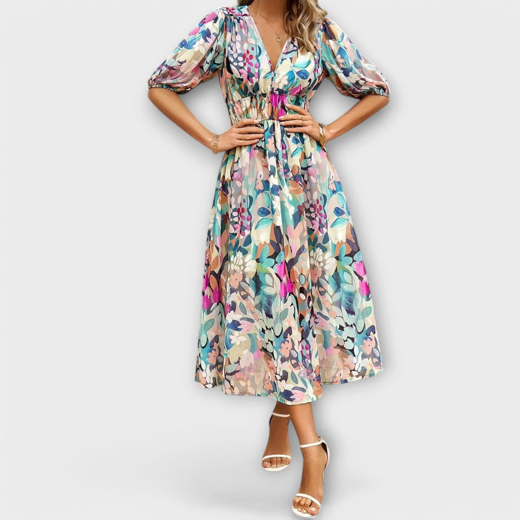 Softly tailored midi dress with a flattering, feminine cut.