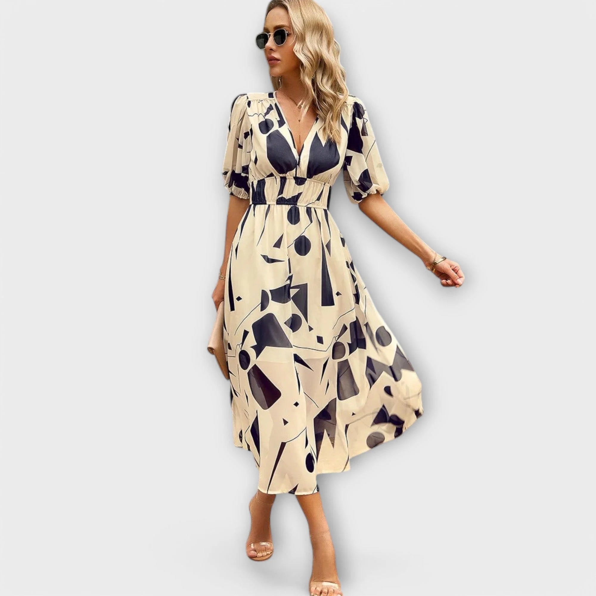 Softly tailored midi dress with a flattering, feminine cut.