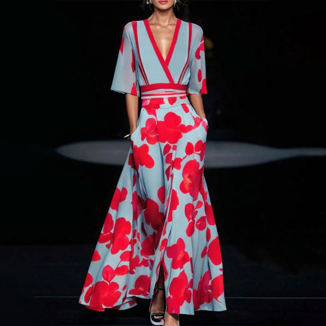 Elegant wrap-front maxi dress with a defined waist and a sweeping skirt.