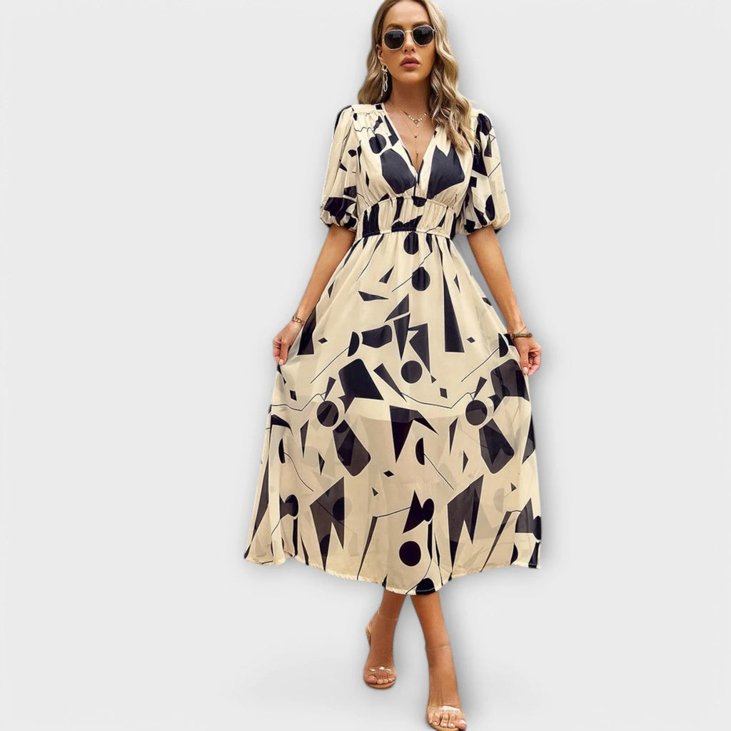 Softly tailored midi dress with a flattering, feminine cut.