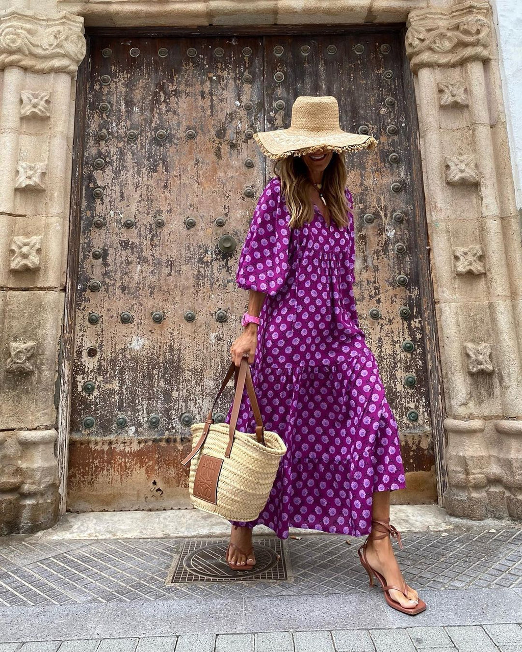 Lightweight floral-print summer dress with an airy, relaxed drape.
