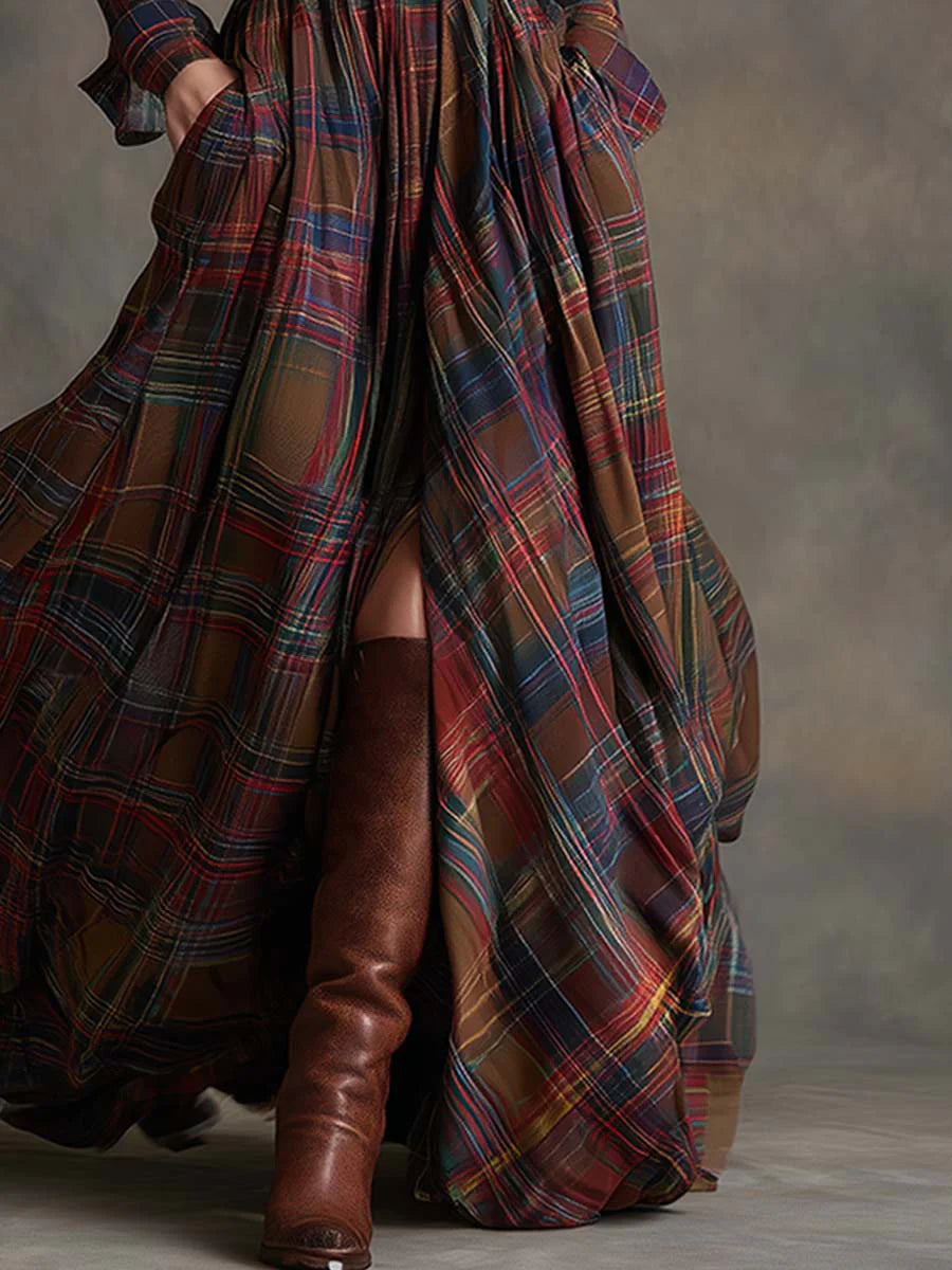 Plaid shirt dress with a button-up bodice, full flowing skirt and matching belt.