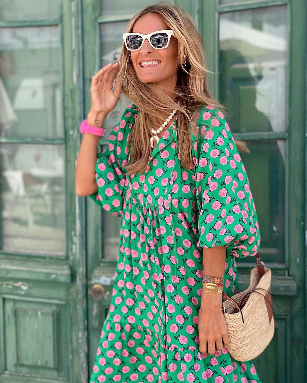 Lightweight floral-print summer dress with an airy, relaxed drape.