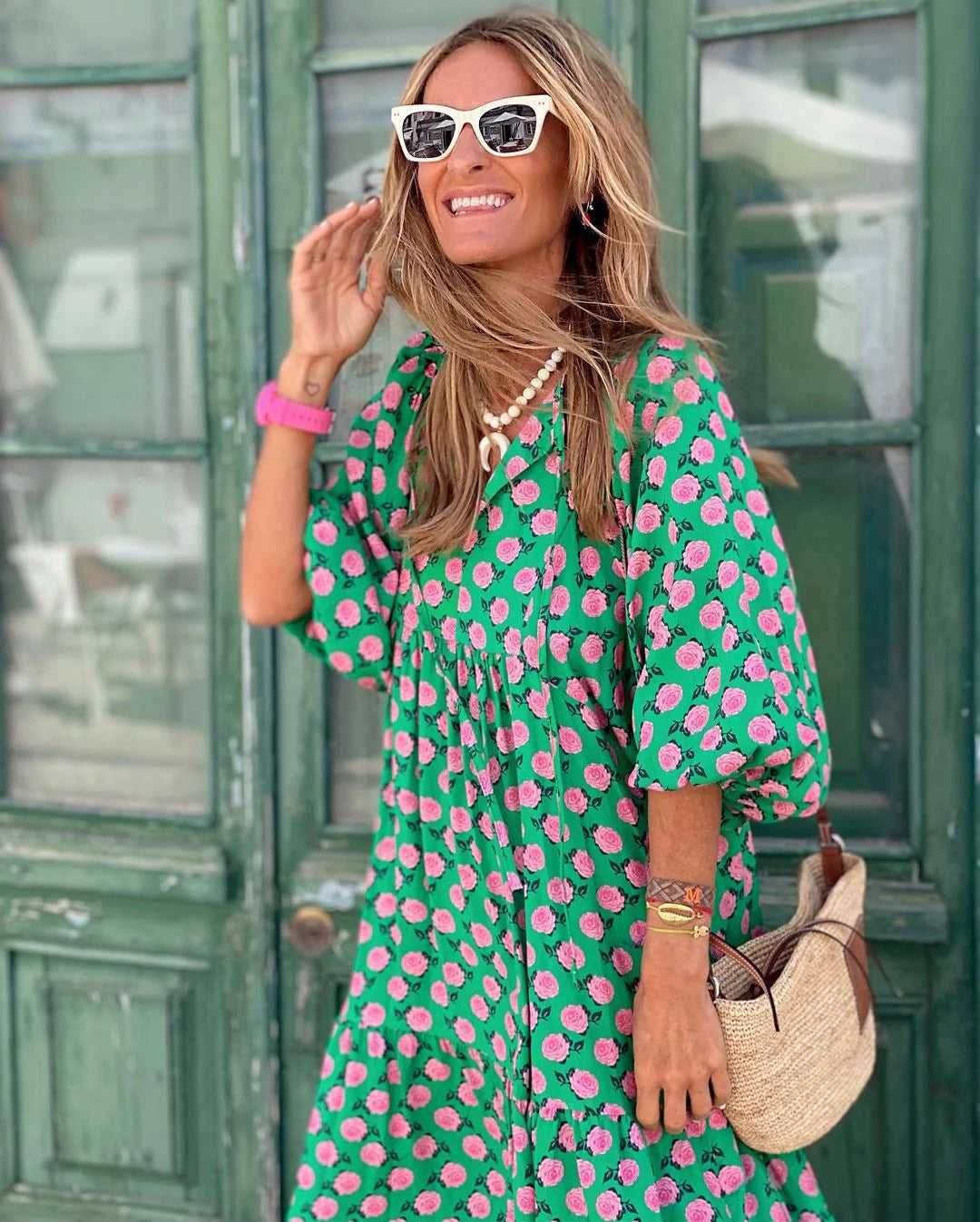 Lightweight floral-print summer dress with an airy, relaxed drape.
