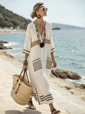 Soft woven-blend summer maxi dress with a relaxed, flowing line.