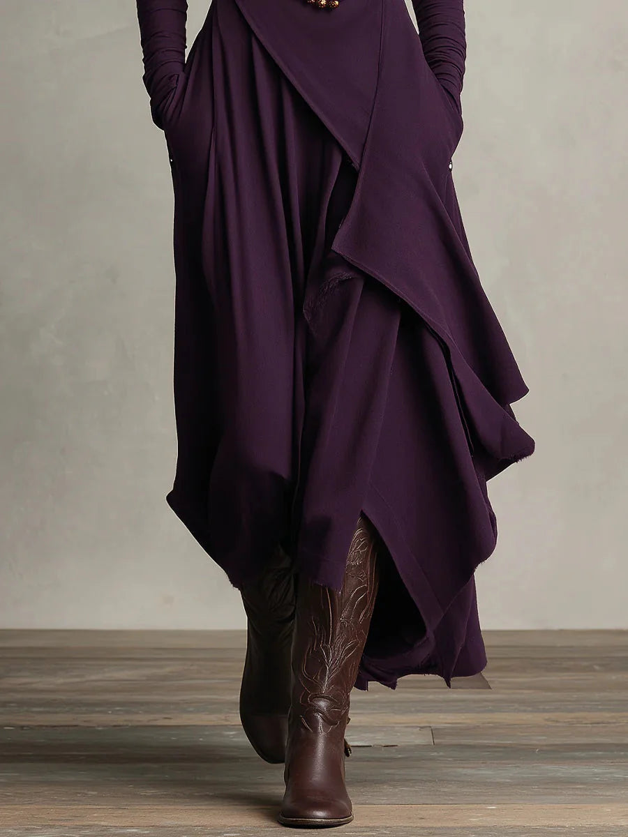 Refined boho maxi dress with a soft V-neck, long sleeves and fluid full-length line.