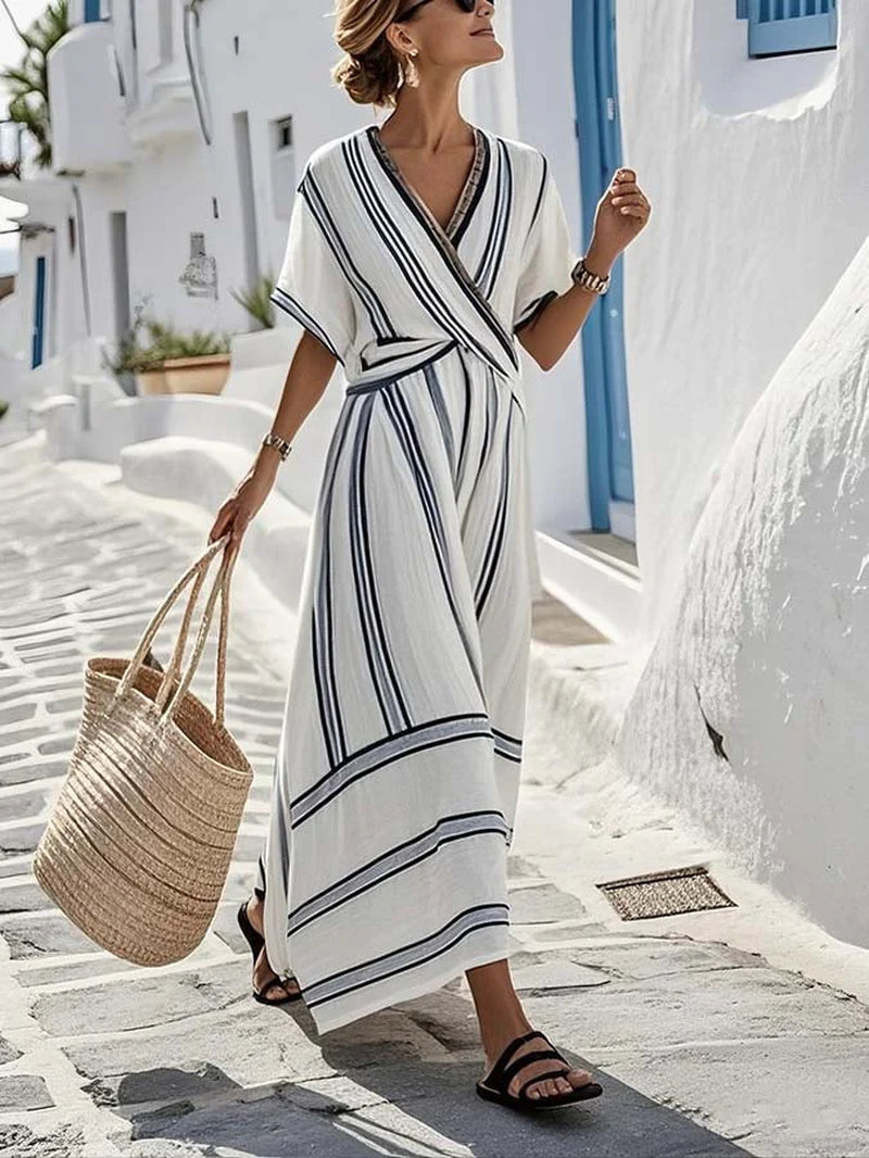 Light summer dress in soft woven fabric with an easy, flattering line.