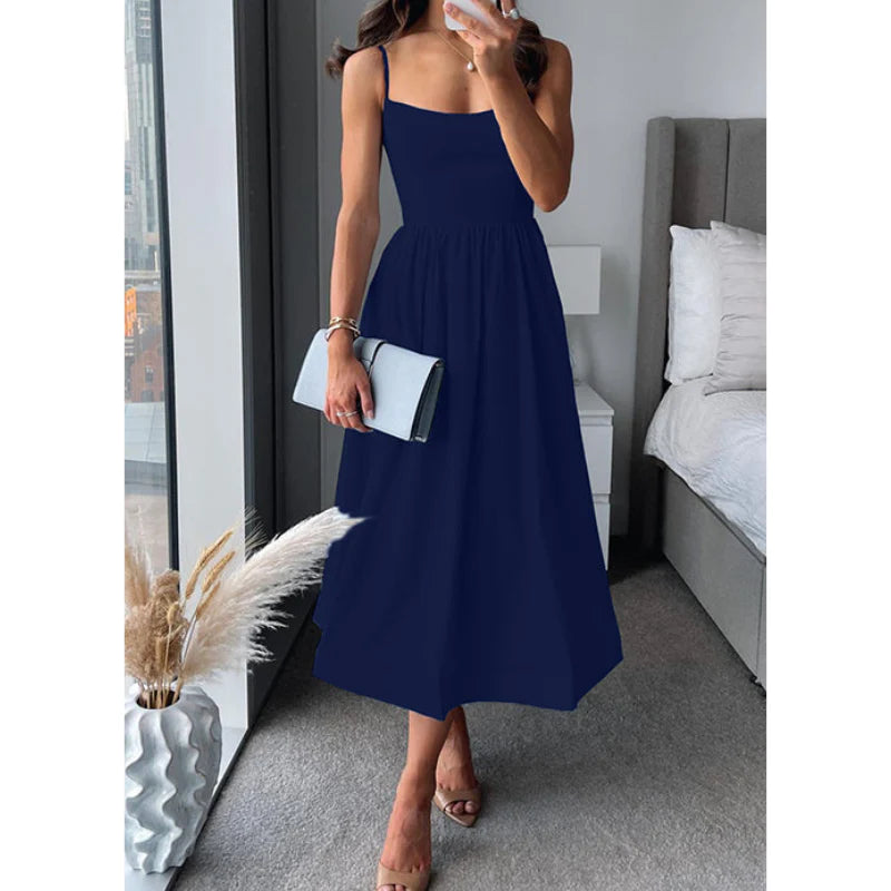 Graceful midi dress with fine straps and a light, easy drape.