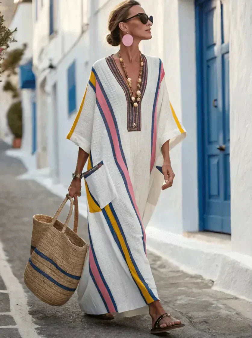 Soft woven-blend summer maxi dress with a relaxed, flowing line.