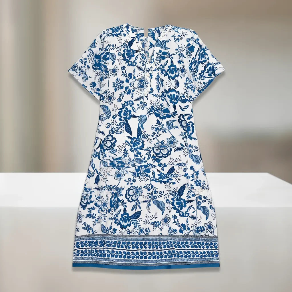Relaxed floral midi dress with a V-neckline and short sleeves.