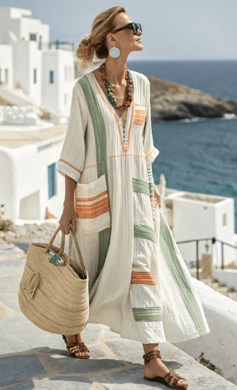 Soft woven-blend summer maxi dress with a relaxed, flowing line.