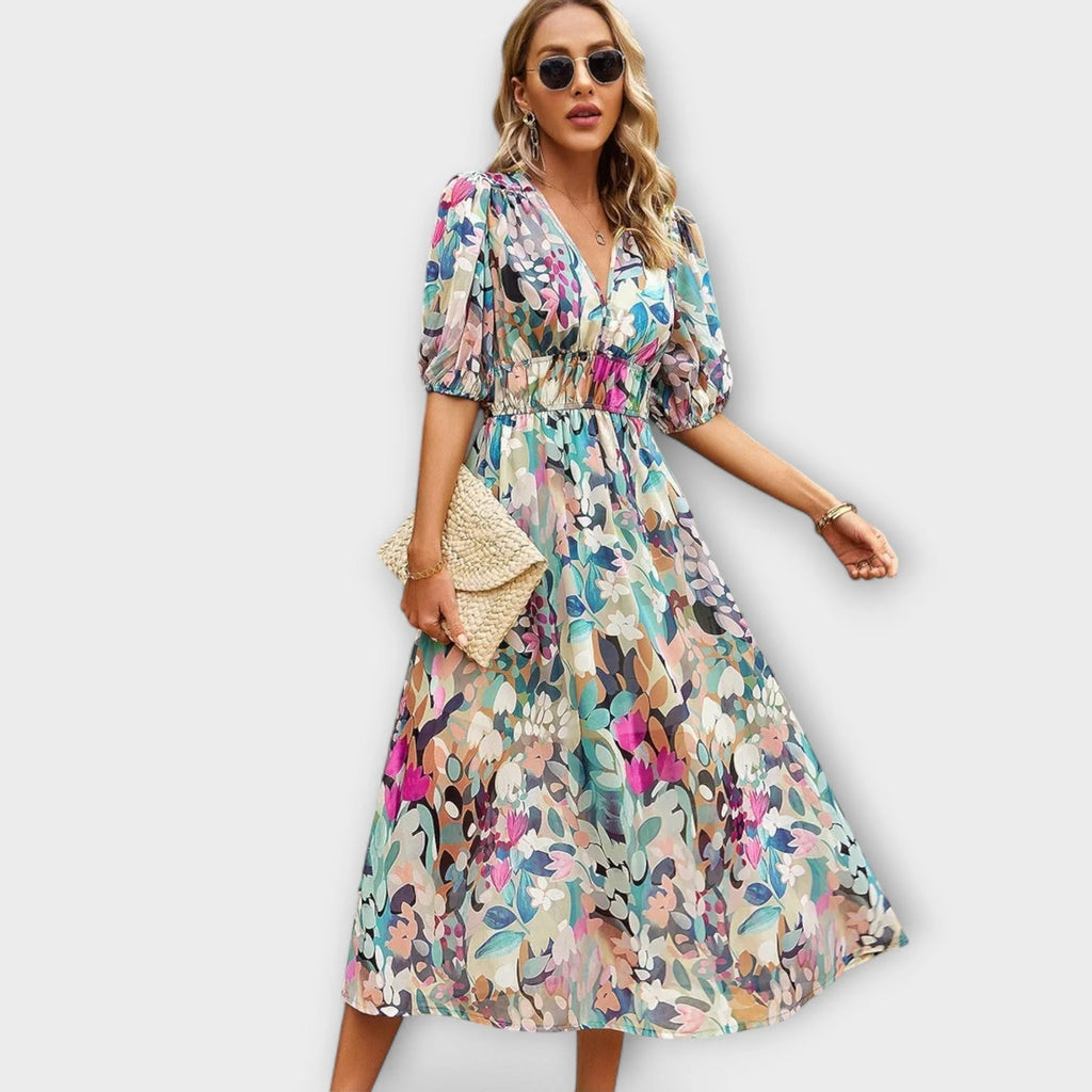 Softly tailored midi dress with a flattering, feminine cut.