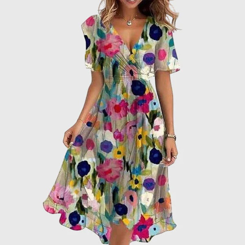 Breezy midi dress with a wrap-effect V-neckline, cinched waist and flutter sleeves.
