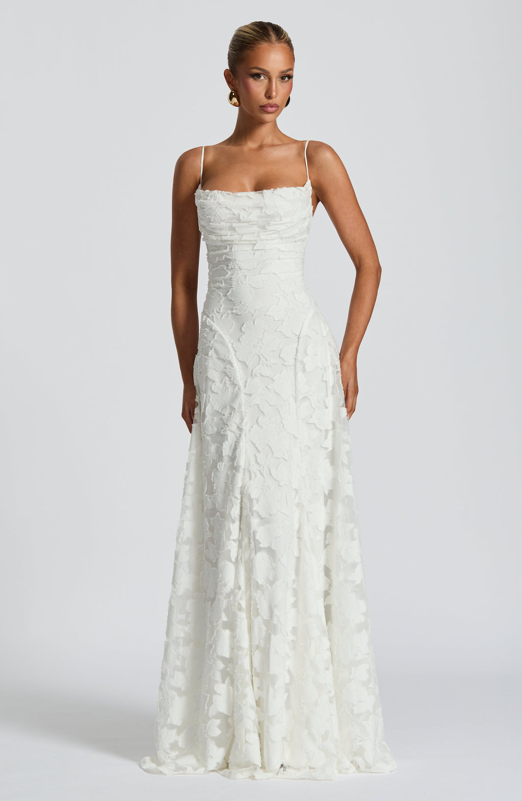 Refined dress in soft, subtly lustrous fabric with a fitted, flowing cut.