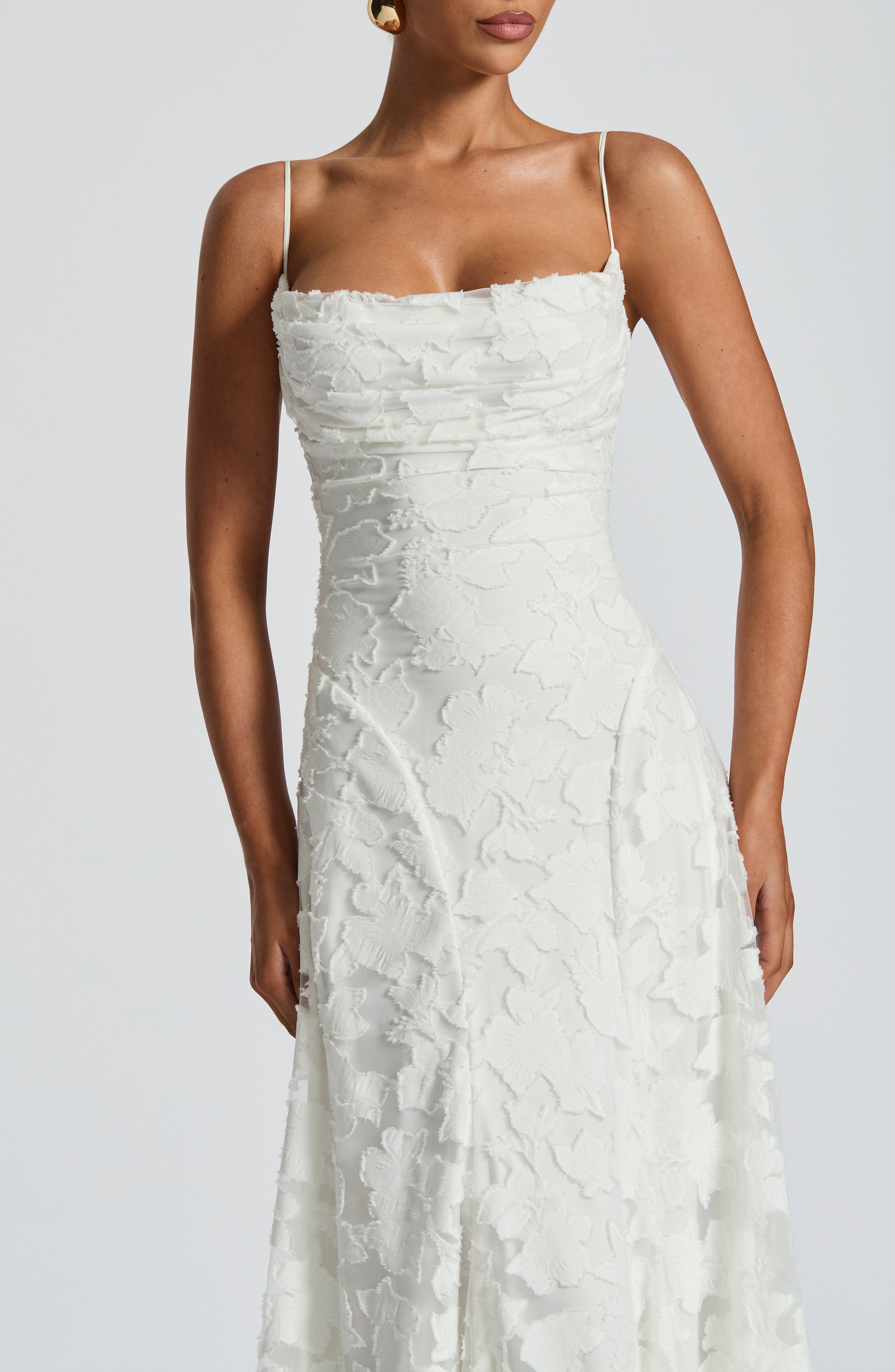 Refined dress in soft, subtly lustrous fabric with a fitted, flowing cut.