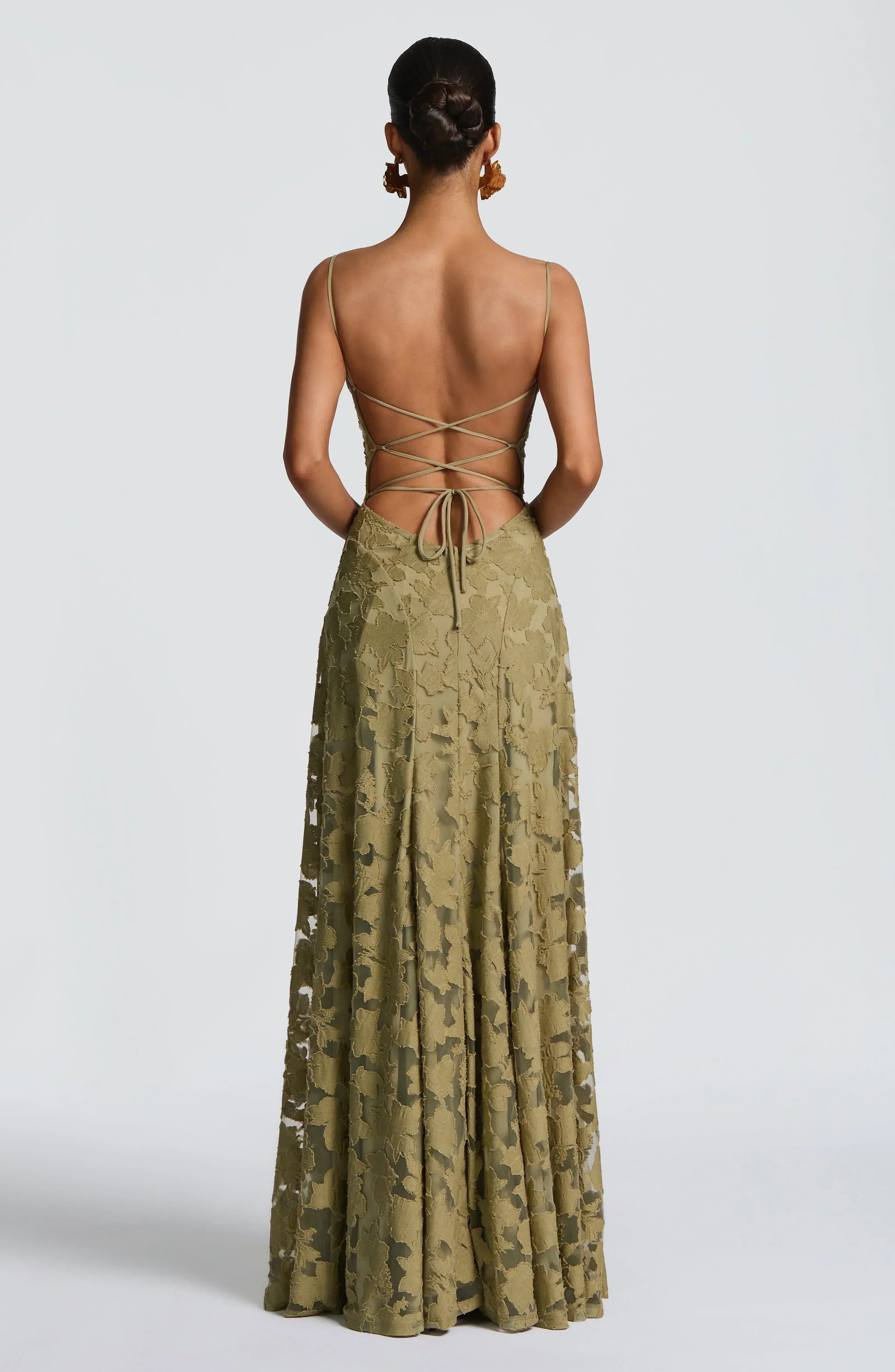 Refined dress in soft, subtly lustrous fabric with a fitted, flowing cut.